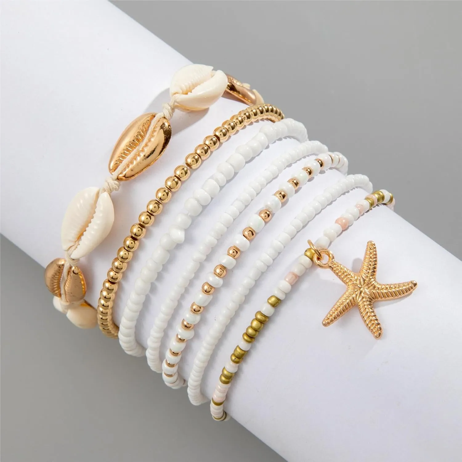 7 Pcs Bohemian Starfish Anklets Gold Boho Ankle Bracelets for Women, Dainty Handmade Adjustable Beaded Starfish & Natural Shell Anklet Set, Waterproof Layered Beach Foot Jewelry for Summer